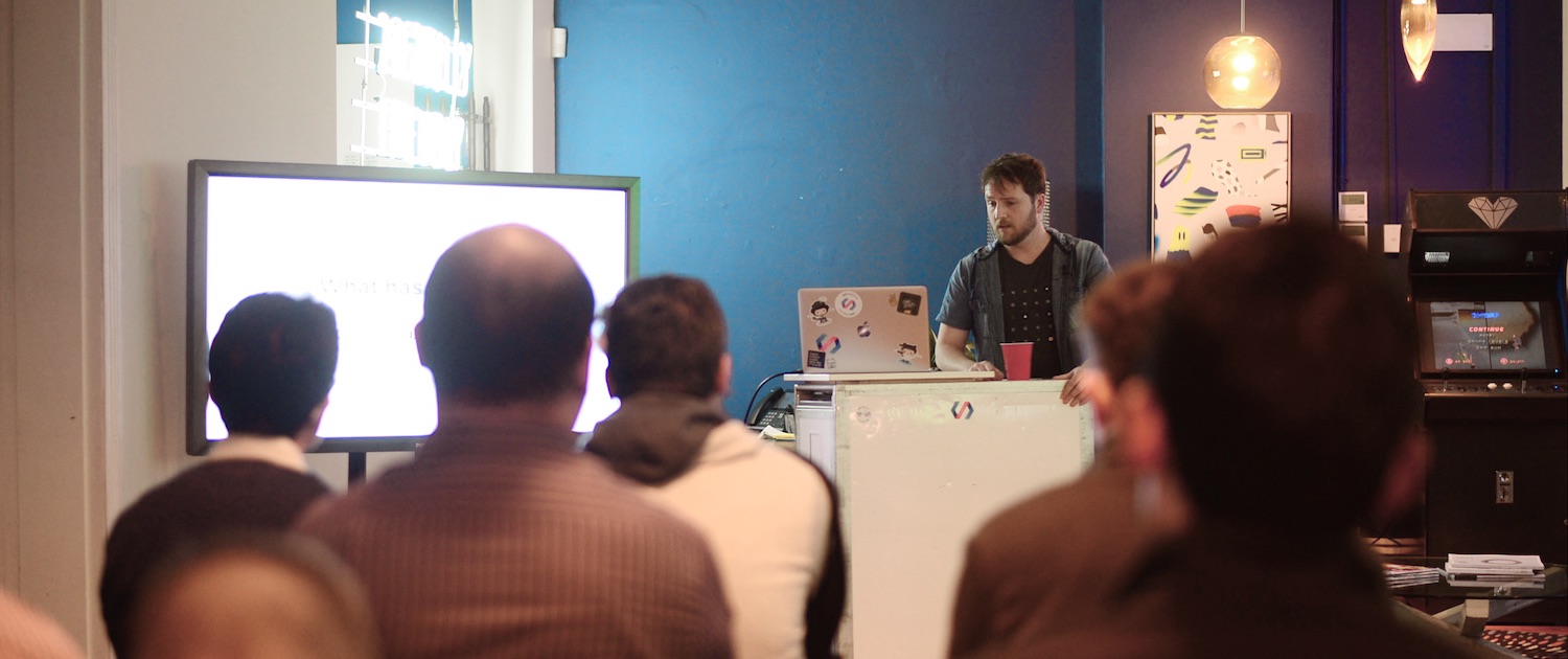 Liam presenting to a crowd